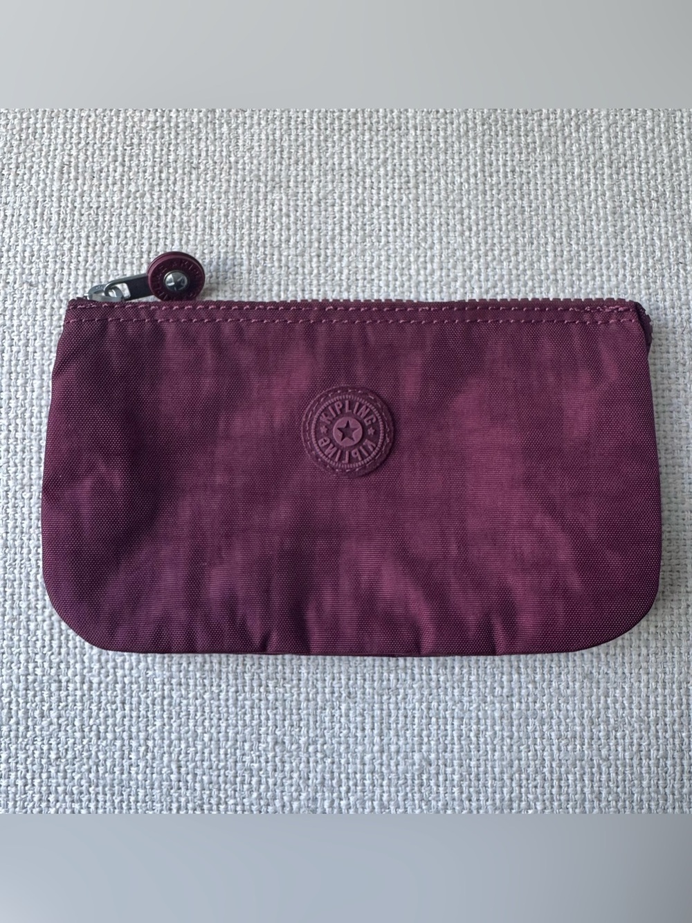 Kipling Creativity Large Maroon Pouch with Embossed Logo